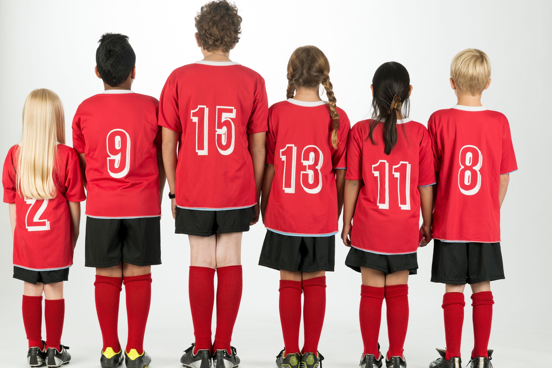 A multi-ethnic group of elementary age children are